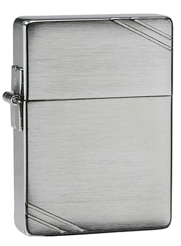 Zippo Lighter 1935 Replica Front View ¾ Angle in brushed chrome look with engraved slashes on opposite corners.
