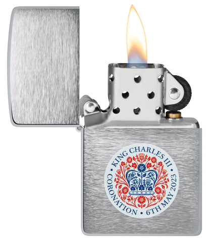 Front view of the open Zippo King Charles Coronation storm lighter, with flame