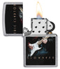 Zippo lighter front view chrome open and lit with coloured image of Eric Clapton playing guitar