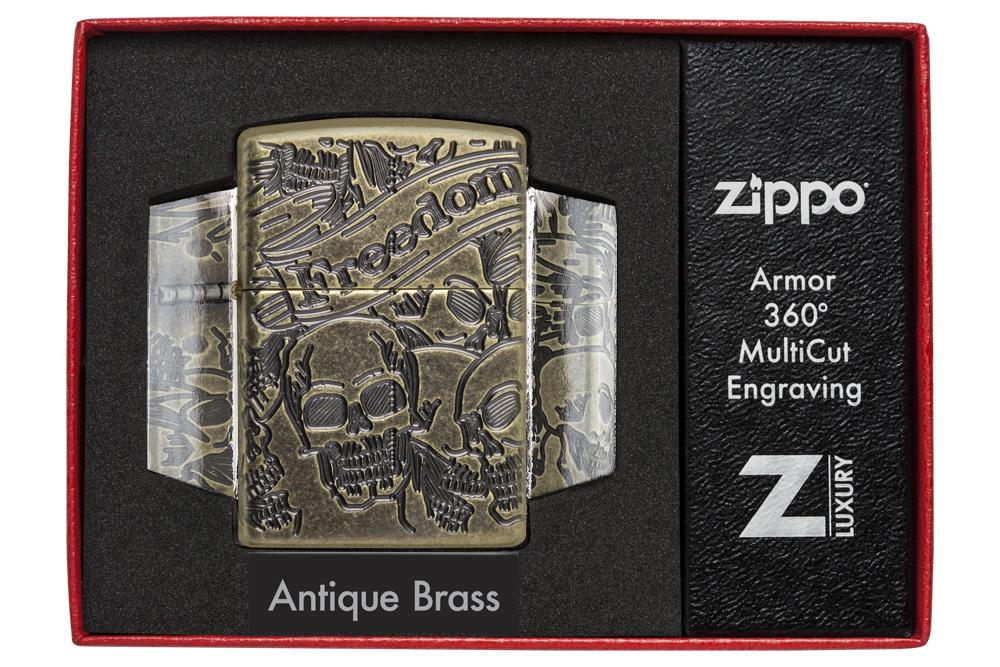 Armor® Antique Brass Skull Design Windproof Lighter in its packaging