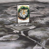 Lifestyle image of Spazuk Tiger Design Windproof Lighter standing on Spazuk artwork