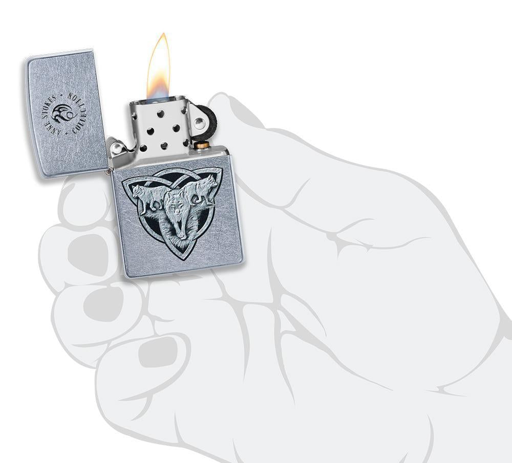 Anne Stokes Wolf design Street Chrome windproof lighter lit in hand