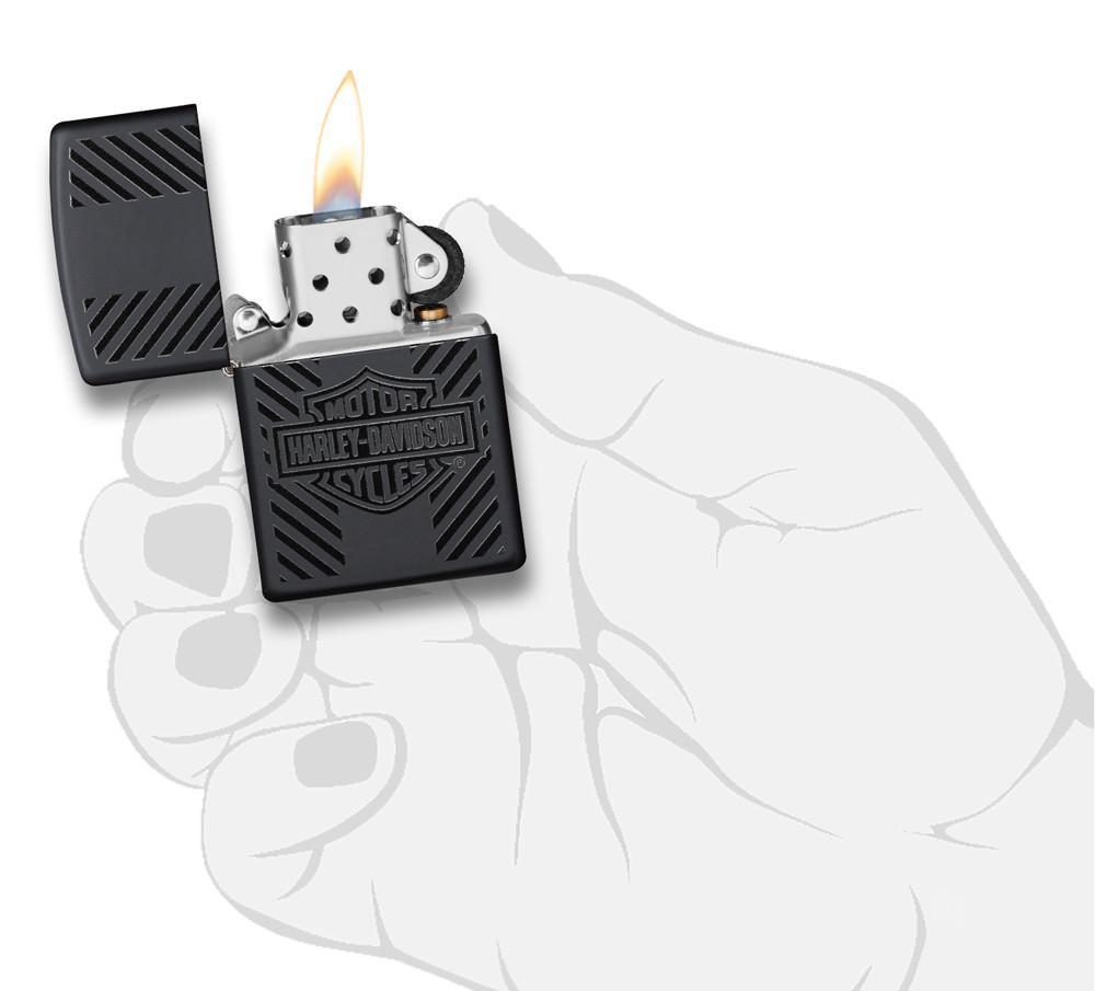 Harley-Davidson® Classic Logo Black Matte Windproof Lighter lit in hand