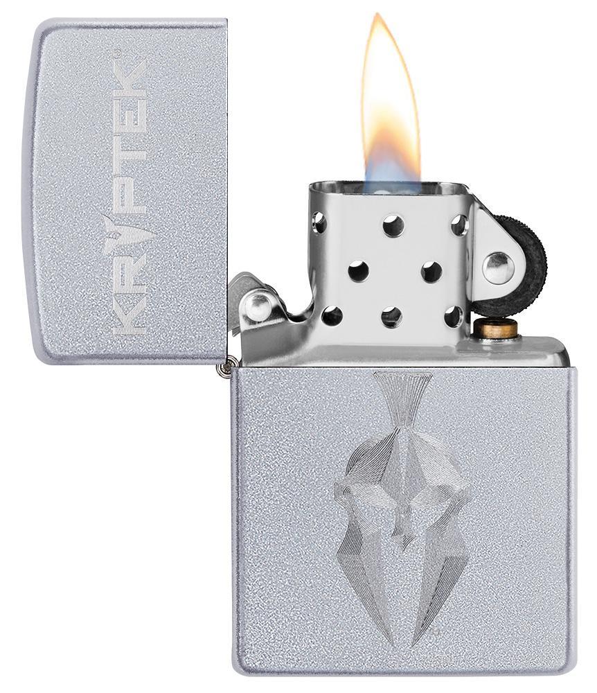 Kryptek Satin Chrome windproof lighter with its lid open and lit
