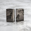 Lifestyle image of Wolves Design Photo Image 360° Black Ice Windproof Lighter standing on a marble surface