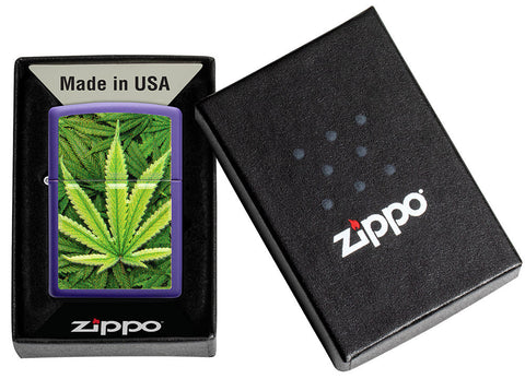 Zippo lighter front view purple matt with image of cannabis plants in open box
