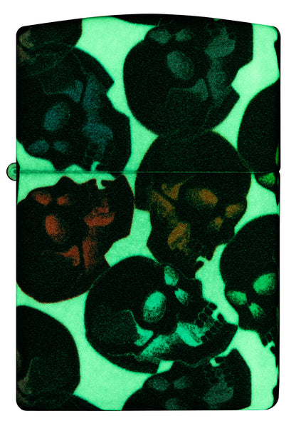 Zippo Lighter Front View Skulls Design with some multicolored skulls shining in the night