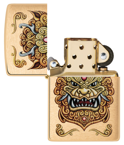 Front view of the open Zippo windproof lighter Foo Dog Design, without flame, showing an imperial golden lions in the style of chinese art.