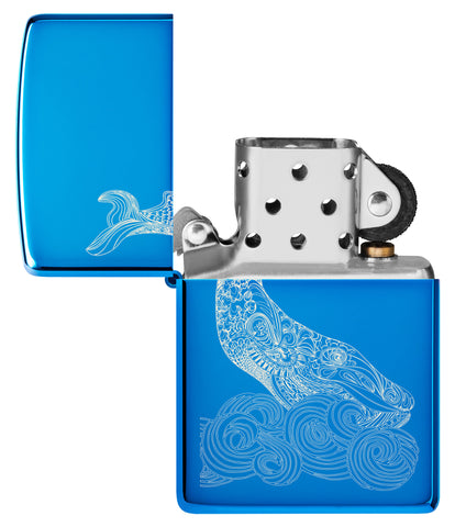 Zippo Lighter Front View Whale Design shiny light blue with an engraved whale with round waves Opened and unlit