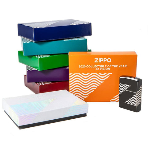 2020 Collectible of the Year Windproof Lighter standing next to the 6 colour packaging options (orange, dark blue, light blue, green, purple, and red)
